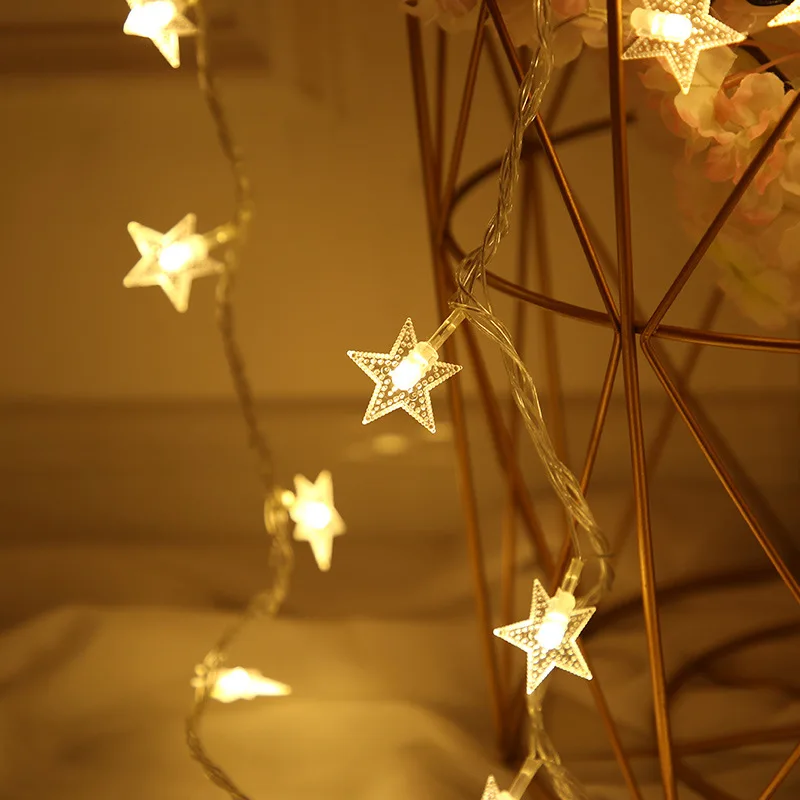 Christmas day wedding decoration lights string room decor five-pointed star shape battery lamp outdoor creative festival lights 
Christmas day wedding decoration lights string room decor five-pointed star shape battery lamp outdoor creative festival lights