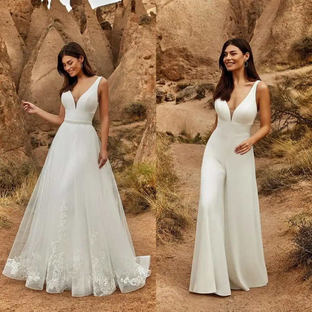 Romantic Lace Wedding Dresses Deep V Neck Satin Jumpsuit with Detachable Skirt Custom Made Bridal Pants Suit Women Outfit 
Romantic Lace Wedding Dresses Deep V Neck Satin Jumpsuit with Detachable Skirt Custom Made Bridal Pants Suit Women Outfit