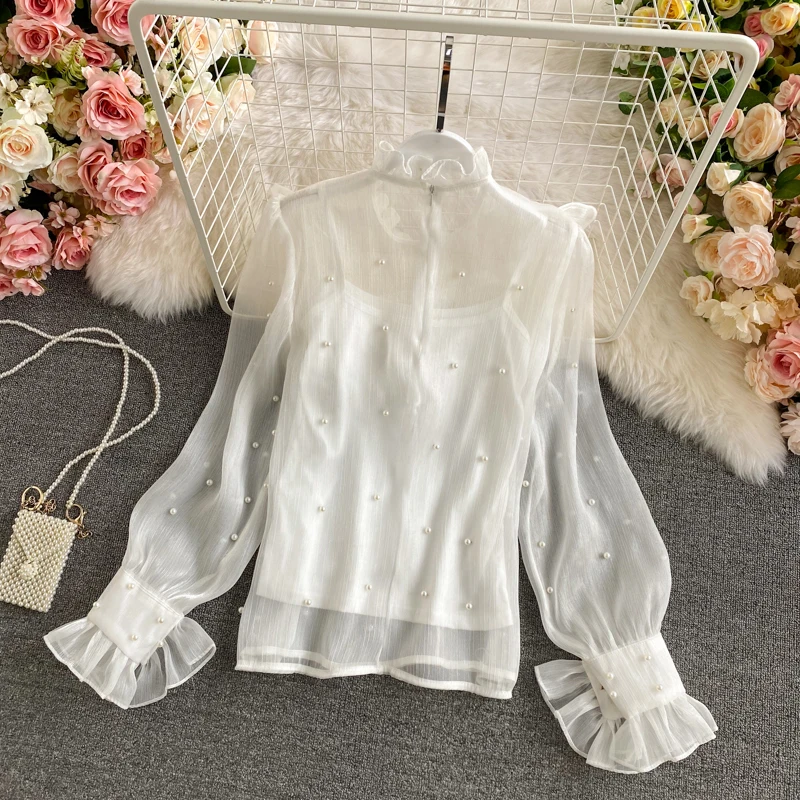 2021 New Spring Autumn New Chiffon Shirt Women Stand-up Collar Bow Tie Ruffled Lantern Sleeve Bottoming Shirt Top
2021 New Spring Autumn New Chiffon Shirt Women Stand-up Collar Bow Tie Ruffled Lantern Sleeve Bottoming Shirt Top