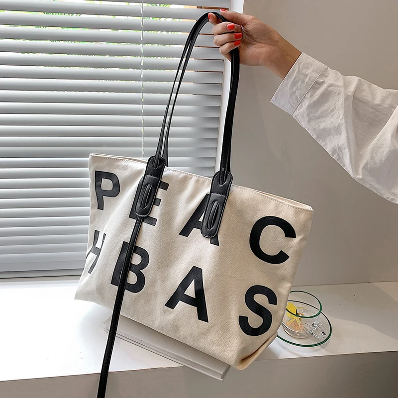 Large capacity bags in summer women's 2021 new fashion design canvas shoulder bag Joker tote bag
Large capacity bags in summer women's 2021 new fashion design canvas shoulder bag Joker tote bag