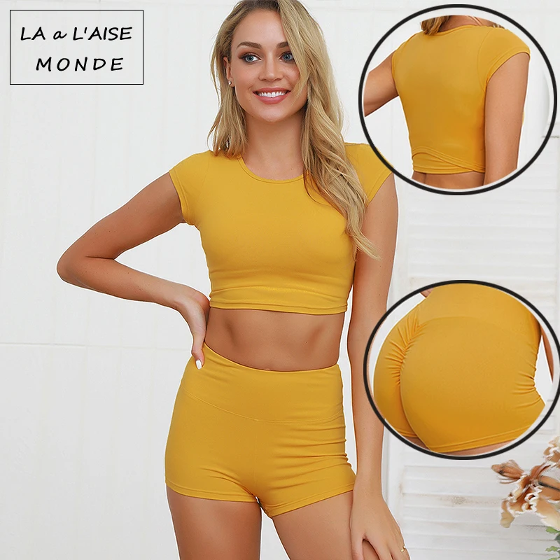 Women's Sportswear Yoga Fitness Moisture Wicking Sports Suit Running Quick Drying Solid Color Short Sleeved Yoga Set 2 Pieces
Women's Sportswear Yoga Fitness Moisture Wicking Sports Suit Running Quick Drying Solid Color Short Sleeved Yoga Set 2 Pieces