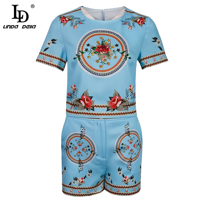 LD LINDA DELLA 2021 Summer New Casual Blue Short Sets Women's Short Sleeve Beading Tops and Flower print Shorts Two Pieces Suit
LD LINDA DELLA 2021 Summer New Casual Blue Short Sets Women's Short Sleeve Beading Tops and Flower print Shorts Two Pieces Suit