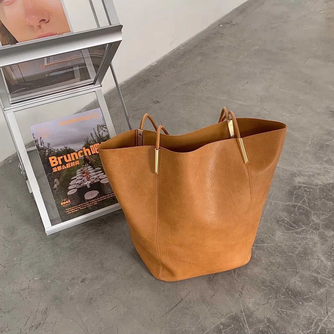 Ladies shoulder bag designer bag luxury handbag travel retro bucket bag large capacity casual tote bag 2021
Ladies shoulder bag designer bag luxury handbag travel retro bucket bag large capacity casual tote bag 2021