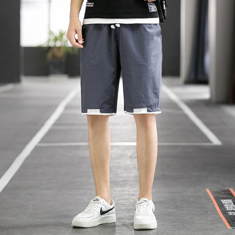 Men's Shorts Summer Leisure 2021 New Trend Loose Wear Ice Thin Sports Pants Elastic Waist Sweat Shorts Men Casual Knee Length
Men's Shorts Summer Leisure 2021 New Trend Loose Wear Ice Thin Sports Pants Elastic Waist Sweat Shorts Men Casual Knee Length