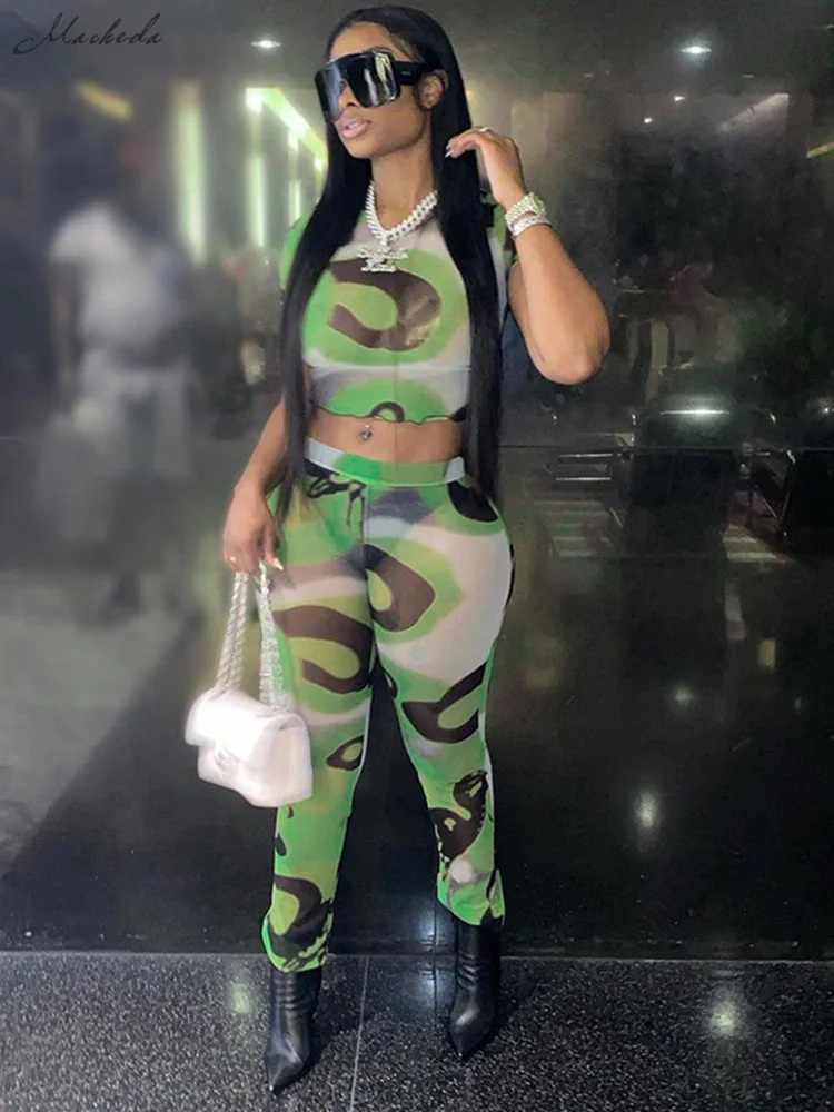 Macheda Spring crop tight short sleeve top A slim two-piece with a sexy green sheer crop top and high-waisted tight trousers
Macheda Spring crop tight short sleeve top A slim two-piece with a sexy green sheer crop top and high-waisted tight trousers