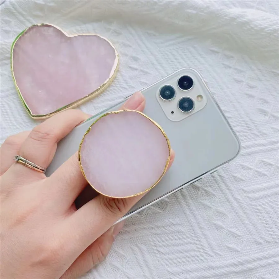 Natural Rose Quartz Crystal And Agate Mobile Phone Telescopic Air Bag Holder Paste Type Lazy Mobile Phone Holder
Natural Rose Quartz Crystal And Agate Mobile Phone Telescopic Air Bag Holder Paste Type Lazy Mobile Phone Holder