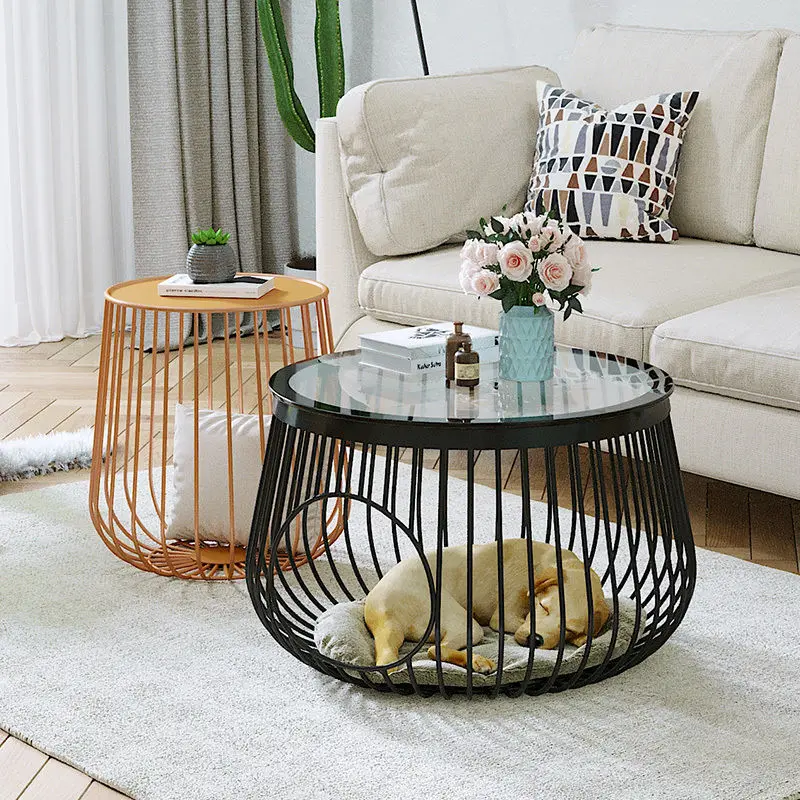Nordic creative people and cats share coffee table, small pet cat nest and household glass tea table. 
Nordic creative people and cats share coffee table, small pet cat nest and household glass tea table.