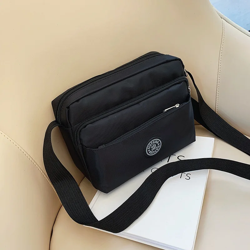 2021 Casual Solid Color Women Bags Luxury Designer Shoulder Bag Nylon Cloth Lady Messenger Bag Mobile Phone Bag Wholesale
2021 Casual Solid Color Women Bags Luxury Designer Shoulder Bag Nylon Cloth Lady Messenger Bag Mobile Phone Bag Wholesale
