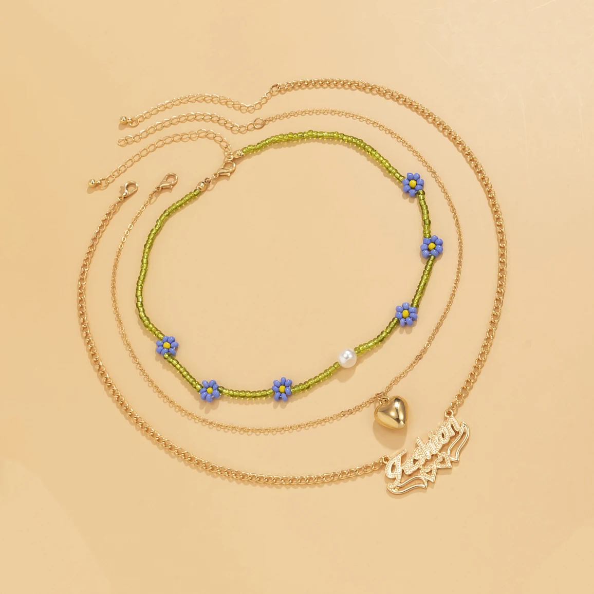 Boho Small Beads Chain Flower Short Choker Necklace for Women Layered Heart/Letter Pendants Necklaces 2021 Fashion Jewelry Gifts 
Boho Small Beads Chain Flower Short Choker Necklace for Women Layered Heart/Letter Pendants Necklaces 2021 Fashion Jewelry Gifts