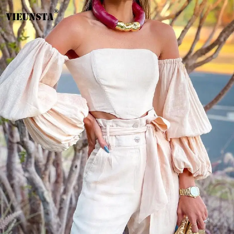 Женский костюм с открытыми плечами, пикантный весенний Топ с рукавами-фонариками и брюки с поясом на шнуровке, однотонный костюм из 2 предме... 
Женский костюм с открытыми плечами, пикантный весенний Топ с рукавами-фонариками и брюки с поясом на шнуровке, однотонный костюм из 2 предме...