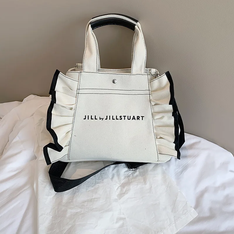 Дизайнерские холщовые дамские сумочки, вместительный мессенджер на одно плечо с оборками, Повседневная дорожная сумка 
Дизайнерские холщовые дамские сумочки, вместительный мессенджер на одно плечо с оборками, Повседневная дорожная сумка