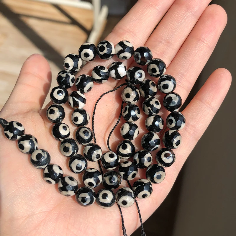 Граненые бусины из тибетского мистического агата с черными глазами, круглые бусины из натурального камня для самостоятельного изготовлени...
Граненые бусины из тибетского мистического агата с черными глазами, круглые бусины из натурального камня для самостоятельного изготовлени...