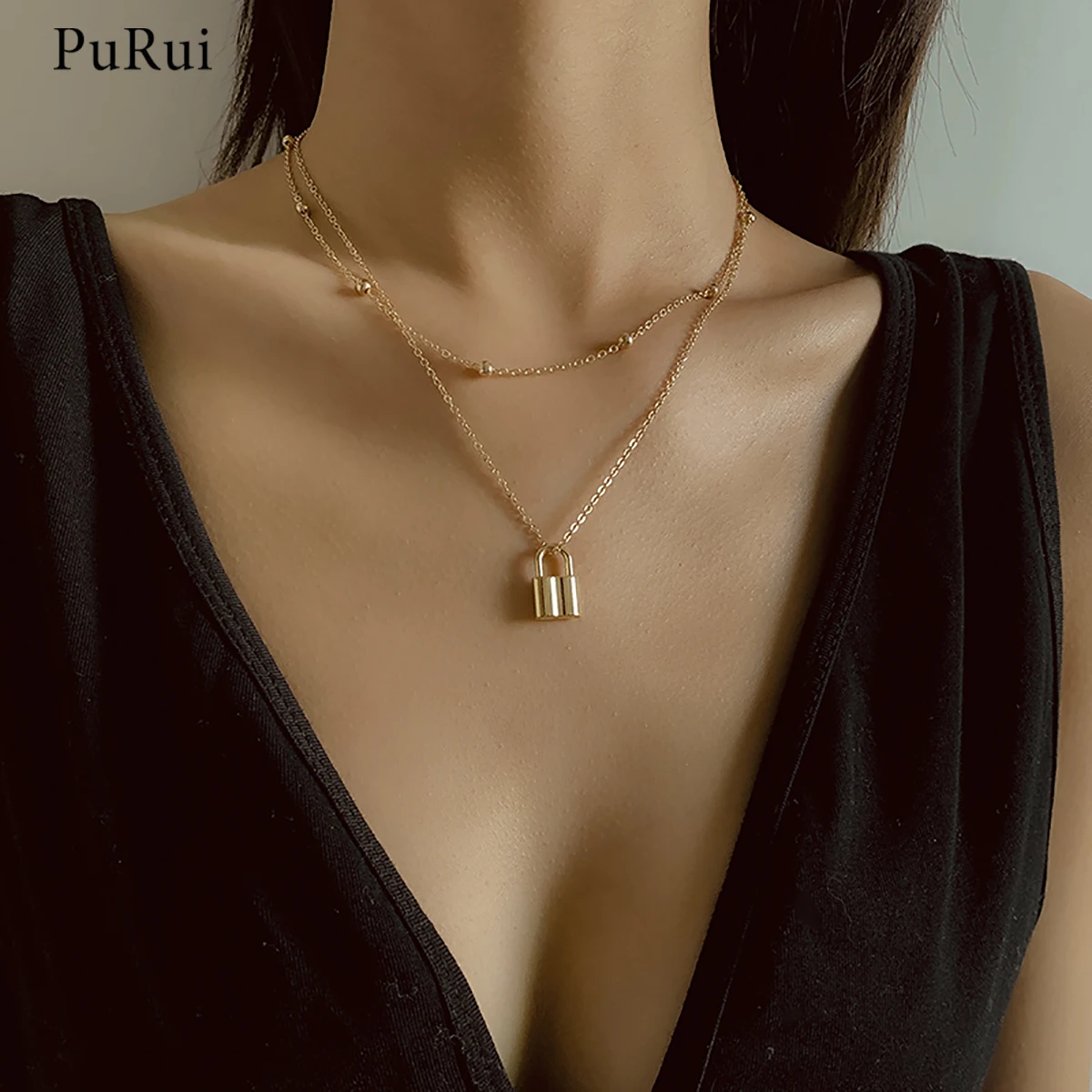 PuRui 2 Layered Small Beads Chain With Lock Pendants Necklaces for Women Gold/Silver Color Padlock Necklace 2021 Fashion Jewelry
PuRui 2 Layered Small Beads Chain With Lock Pendants Necklaces for Women Gold/Silver Color Padlock Necklace 2021 Fashion Jewelry