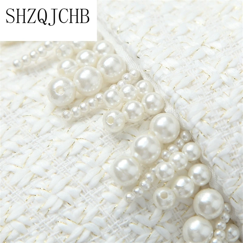Designer Fashion Women Turn Down Collar Pearls Tassel Long Tweed Woolen Jackets Winter Elegant Wool Blends Coats Lady Overcoat
Designer Fashion Women Turn Down Collar Pearls Tassel Long Tweed Woolen Jackets Winter Elegant Wool Blends Coats Lady Overcoat