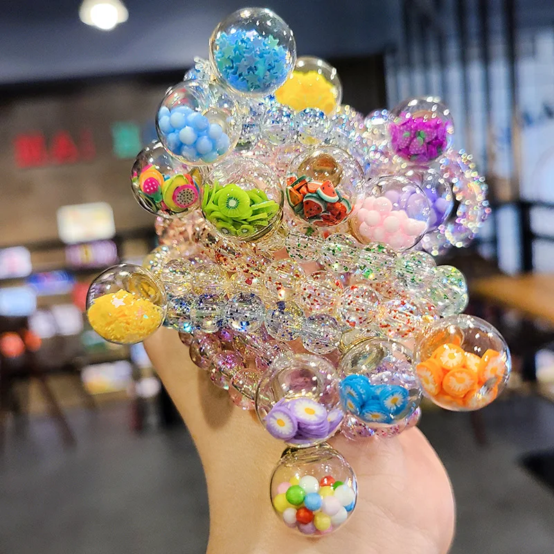 Korean children's bracelet female princess hand-string sand ball baby jewelry toy little girl holiday gift
Korean children's bracelet female princess hand-string sand ball baby jewelry toy little girl holiday gift
