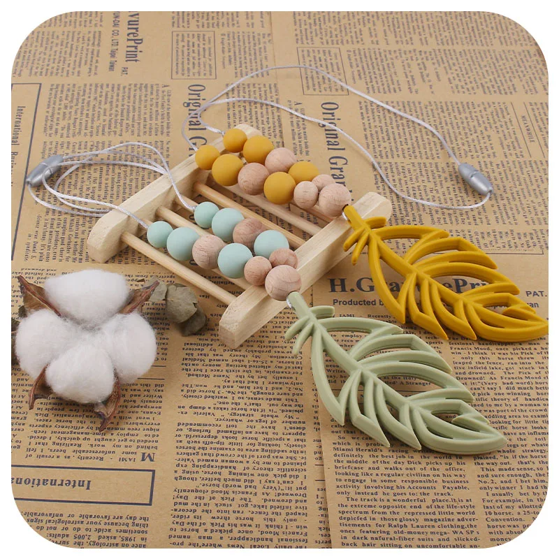 Leaf Shape Silicone Baby Molar Necklace Mother's Necklace Silicone Charm Care Teeth Toy
Leaf Shape Silicone Baby Molar Necklace Mother's Necklace Silicone Charm Care Teeth Toy