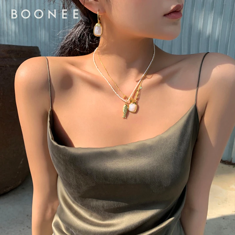 High-Grade Clear Shell Pendant Clavicle Necklace Ear Stud Female
High-Grade Clear Shell Pendant Clavicle Necklace Ear Stud Female