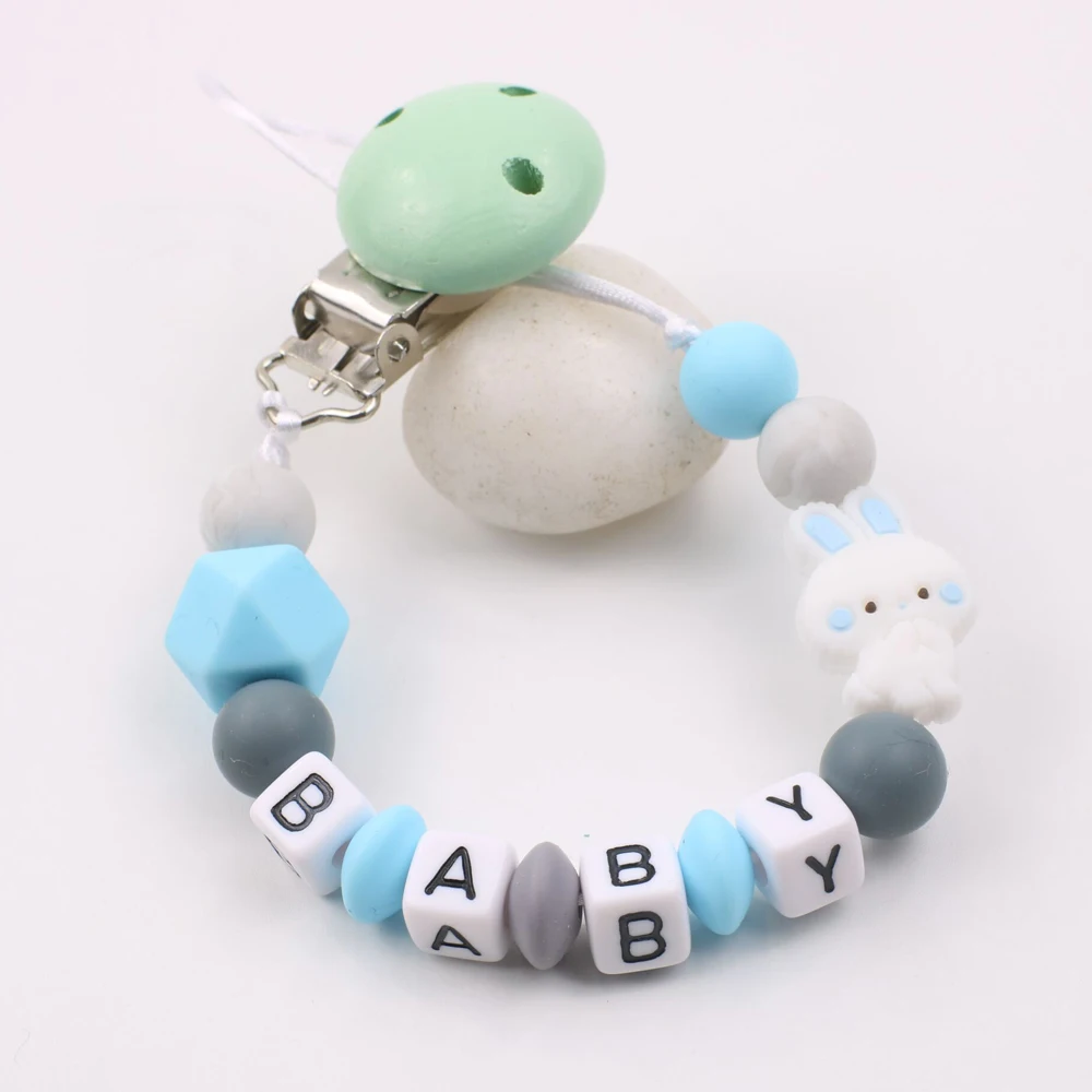 Colorful silicone wooden beads baby pacifier clip rabbit anti-lost chain holder baby feeding toy clip
Colorful silicone wooden beads baby pacifier clip rabbit anti-lost chain holder baby feeding toy clip