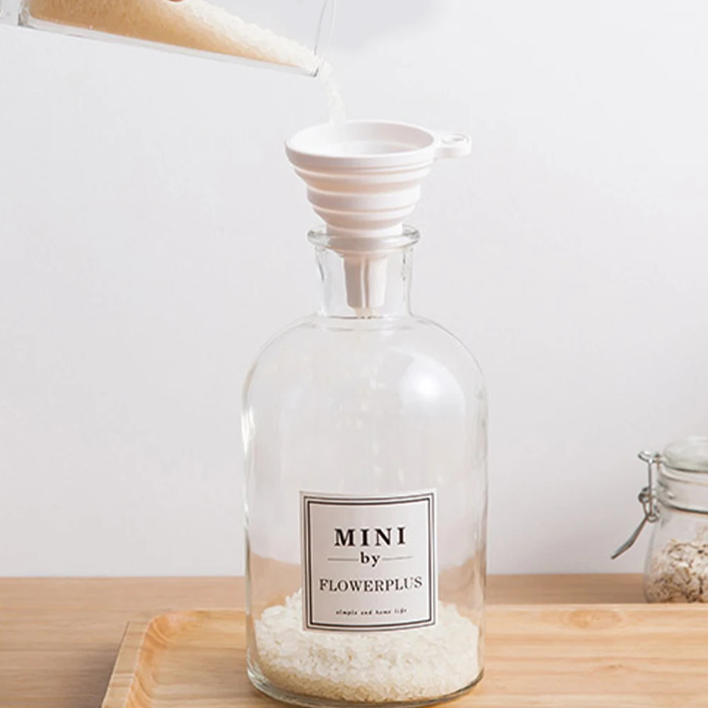 1pcs Silicone Folding Telescopic Long Neck Funnel Creative Household Liquid Dispensing Mini Funnel Kitchen Tools 
1pcs Silicone Folding Telescopic Long Neck Funnel Creative Household Liquid Dispensing Mini Funnel Kitchen Tools