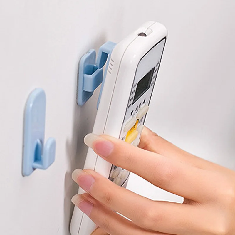Wall Remote Control Holder 4 Hooks Self-Adhesive Pair Plastic Storage Holder Strong Wall Mounted Organizer Stand Container
Wall Remote Control Holder 4 Hooks Self-Adhesive Pair Plastic Storage Holder Strong Wall Mounted Organizer Stand Container