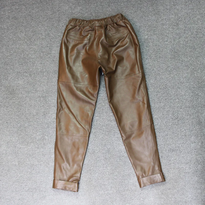 Women Genuine Leather Pants Stretch Plus Size Pencil Pants Female High Quality Brand Rivet Ankle Length Harem Pants Trousers
Women Genuine Leather Pants Stretch Plus Size Pencil Pants Female High Quality Brand Rivet Ankle Length Harem Pants Trousers