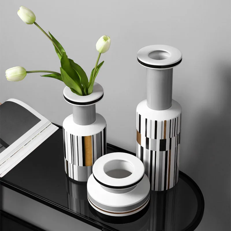 Modern minimalist geometric lines abstract ceramic vase ornaments home decor Nordic vase living room desktop round mouth vase
Modern minimalist geometric lines abstract ceramic vase ornaments home decor Nordic vase living room desktop round mouth vase