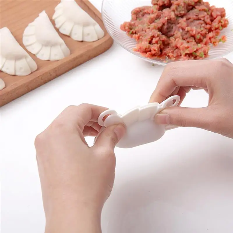 2pcs/Set Portable Dumpling Maker Nonstick Plastic Dumpling Mold Dumpling Press With Spoon Dumpling Mould Cocina Accesorio
2pcs/Set Portable Dumpling Maker Nonstick Plastic Dumpling Mold Dumpling Press With Spoon Dumpling Mould Cocina Accesorio