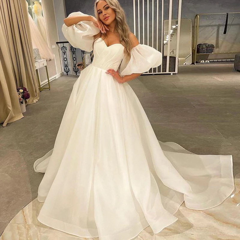 Hot Sale Wedding Dress 2022 A Line Short Puff Sleeves Bridal Gowns Off Shoulder Princess Boho Wedding Gown
Hot Sale Wedding Dress 2022 A Line Short Puff Sleeves Bridal Gowns Off Shoulder Princess Boho Wedding Gown