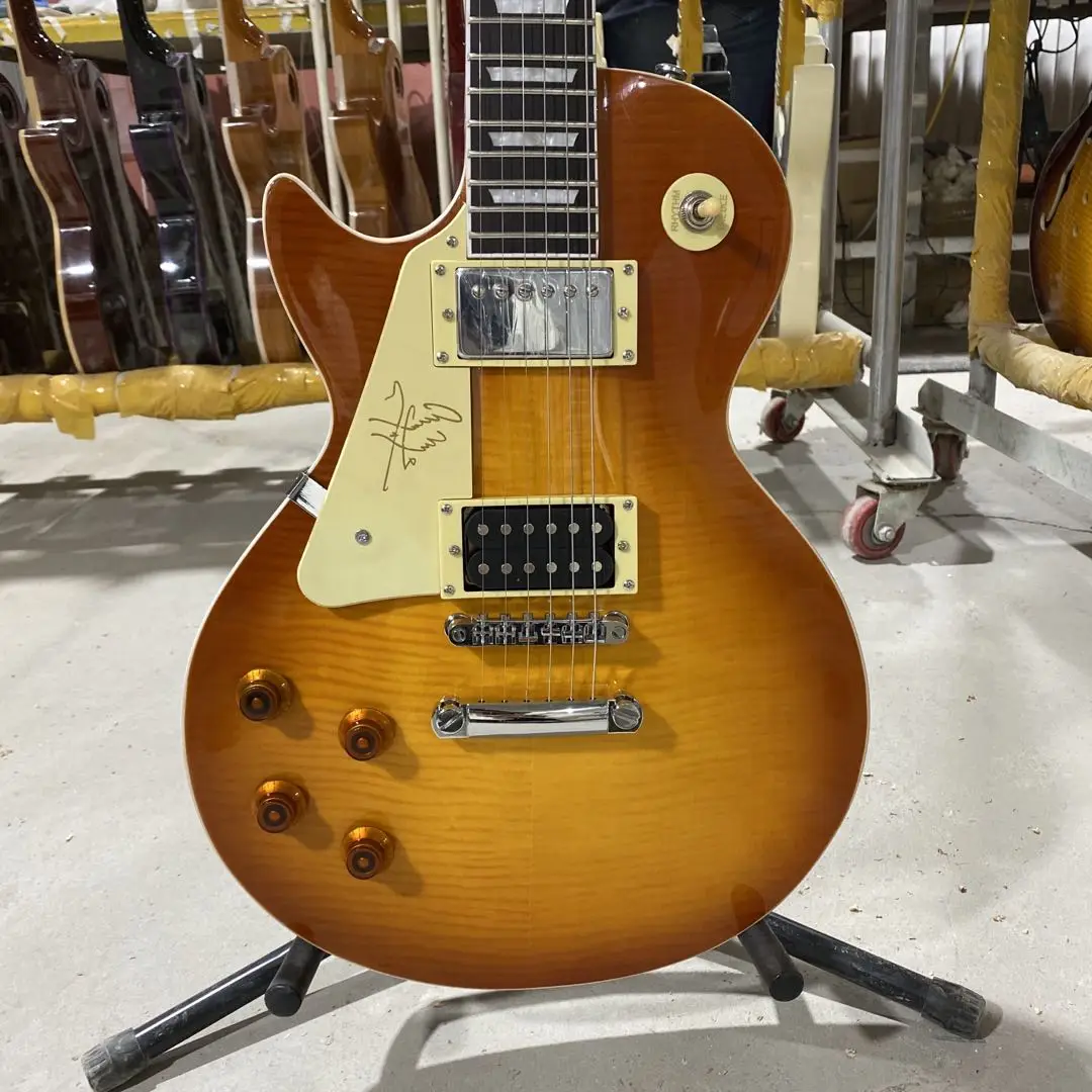 Стандартная электрическая гитара Jimmy Page, корпус из красного дерева, тигр, клен, верхняя панель из палисандра, левая ручка, серебристая фурнит...
Стандартная электрическая гитара Jimmy Page, корпус из красного дерева, тигр, клен, верхняя панель из палисандра, левая ручка, серебристая фурнит...