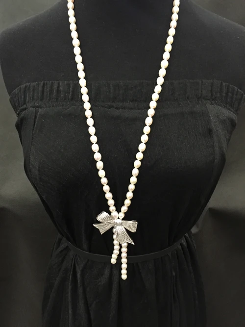 7-8MM natural pearl sweater chain necklace Bowknot rice pearl necklace 80CM length
7-8MM natural pearl sweater chain necklace Bowknot rice pearl necklace 80CM length