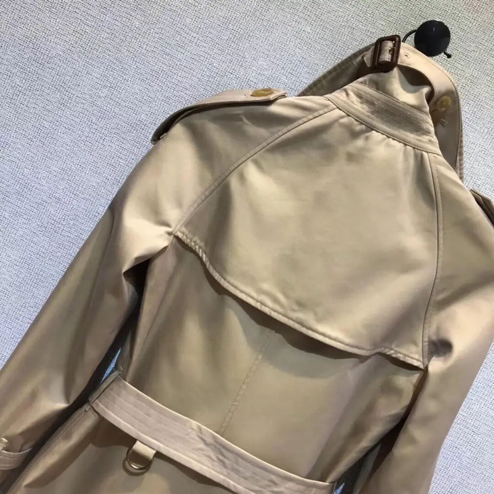 newest high-end waterproof long trench coat women lapel Bird embossed metal button slim belt fashion office lady coats overcoat
newest high-end waterproof long trench coat women lapel Bird embossed metal button slim belt fashion office lady coats overcoat