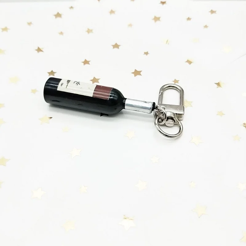 Resin wine bottle keychain, car styling bag pendant, backpack decoration pendant, key chain wholesale
Resin wine bottle keychain, car styling bag pendant, backpack decoration pendant, key chain wholesale