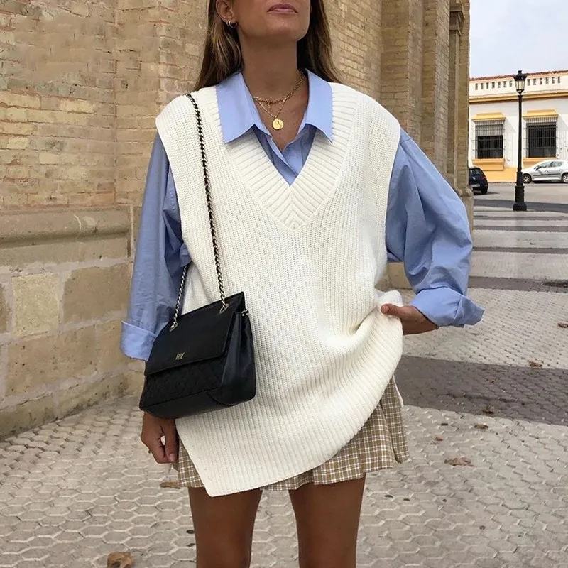Fashion Women V Neck Sleeveless Knitted Vest Sweater 2021 Autumn Winter Split White Korean Preppy Pullover Loose Casual Clothes
Fashion Women V Neck Sleeveless Knitted Vest Sweater 2021 Autumn Winter Split White Korean Preppy Pullover Loose Casual Clothes
