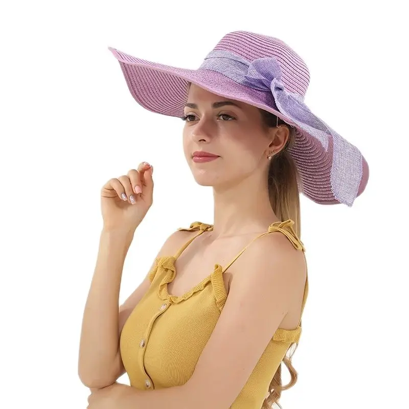 Summmer Women Casual Solid Color Big Brim Straw Cap Female Bow Beach Sunscreen Sun Hat 
Summmer Women Casual Solid Color Big Brim Straw Cap Female Bow Beach Sunscreen Sun Hat