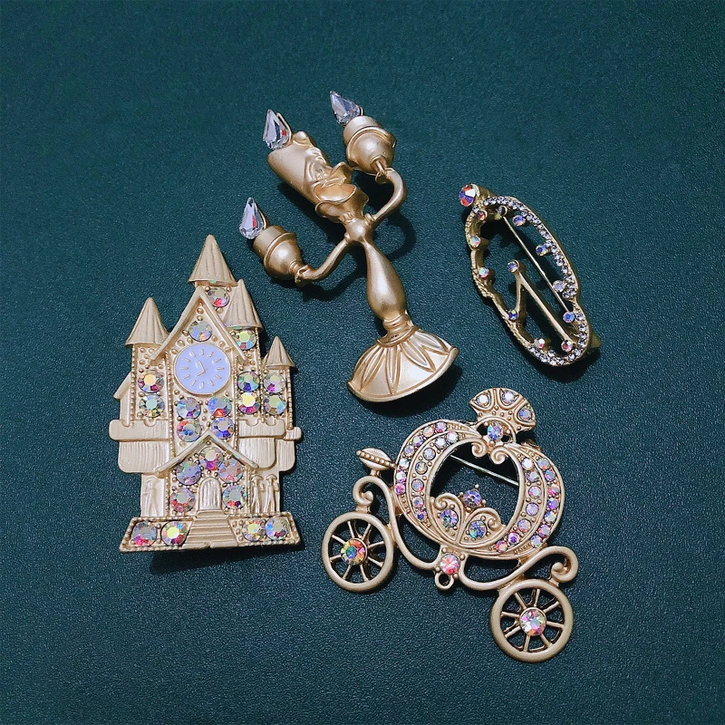 Morkopela golden cartoon fairy tale series brooches vintage candlestick pin jewelry pumpkin carriage and clock brooch for female
Morkopela golden cartoon fairy tale series brooches vintage candlestick pin jewelry pumpkin carriage and clock brooch for female
