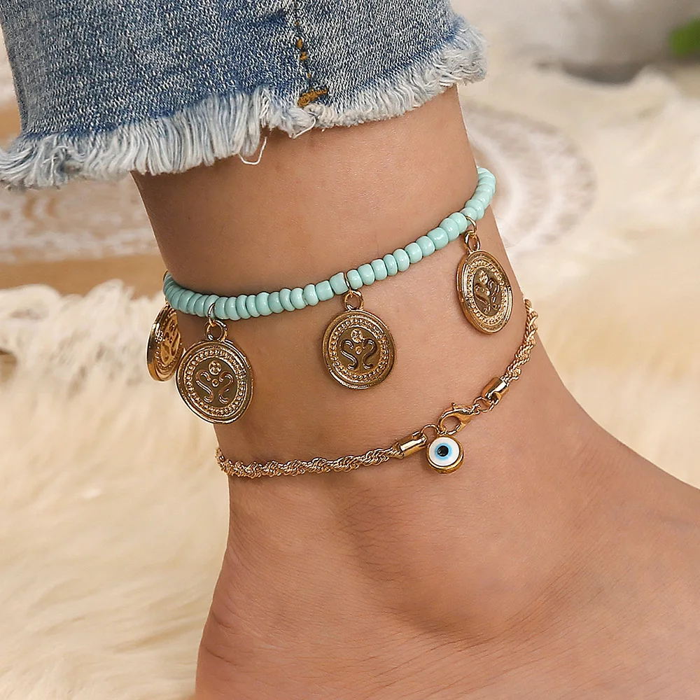 New Anklet Handmade Rice Beads Exquisite Twist Chain Devil's Eye Round Pendant Anklet 2 Piece Set
New Anklet Handmade Rice Beads Exquisite Twist Chain Devil's Eye Round Pendant Anklet 2 Piece Set