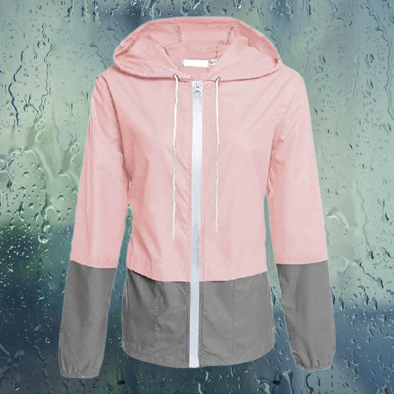 Женская непромокаемая ветровка с капюшоном и завязками
Женская непромокаемая ветровка с капюшоном и завязками