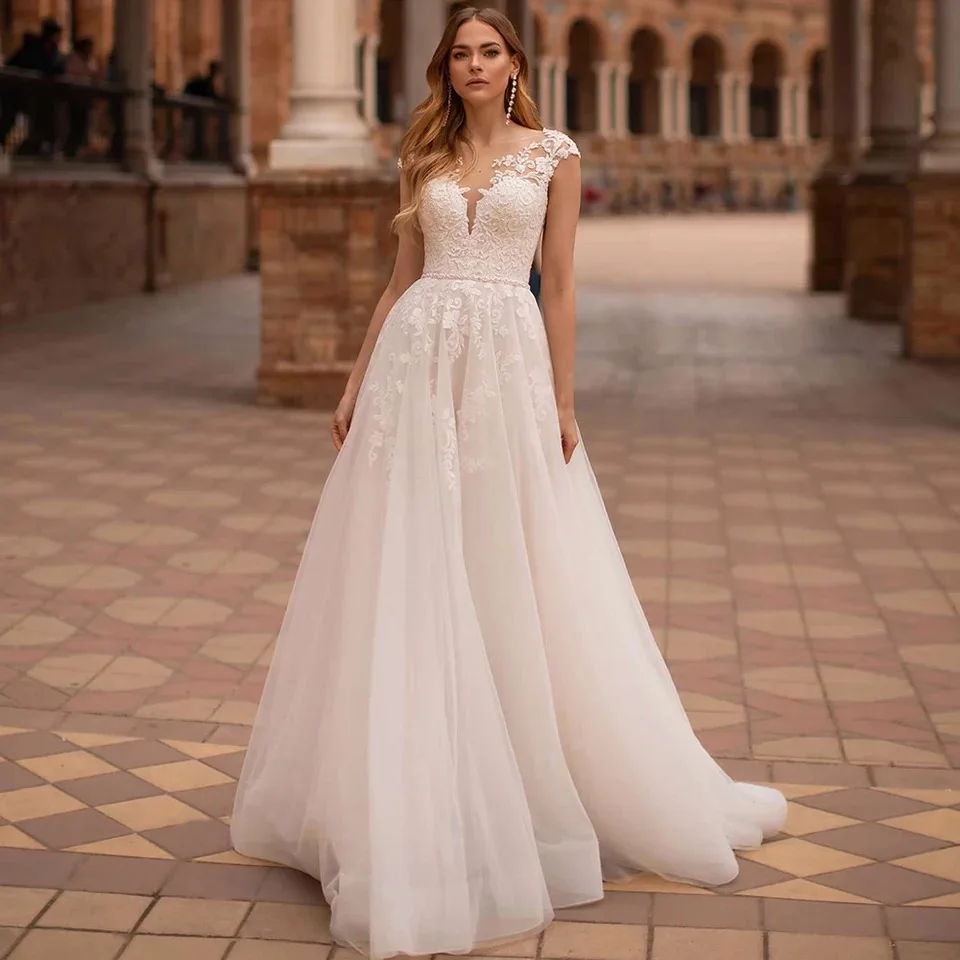 Elegant A-Line Wedding Dresses 2021 Cap Sleeve Sheer Scoop Neck Lace Appliques Button Tulle Bridal Gown Beads Belt Sweep Train
Elegant A-Line Wedding Dresses 2021 Cap Sleeve Sheer Scoop Neck Lace Appliques Button Tulle Bridal Gown Beads Belt Sweep Train