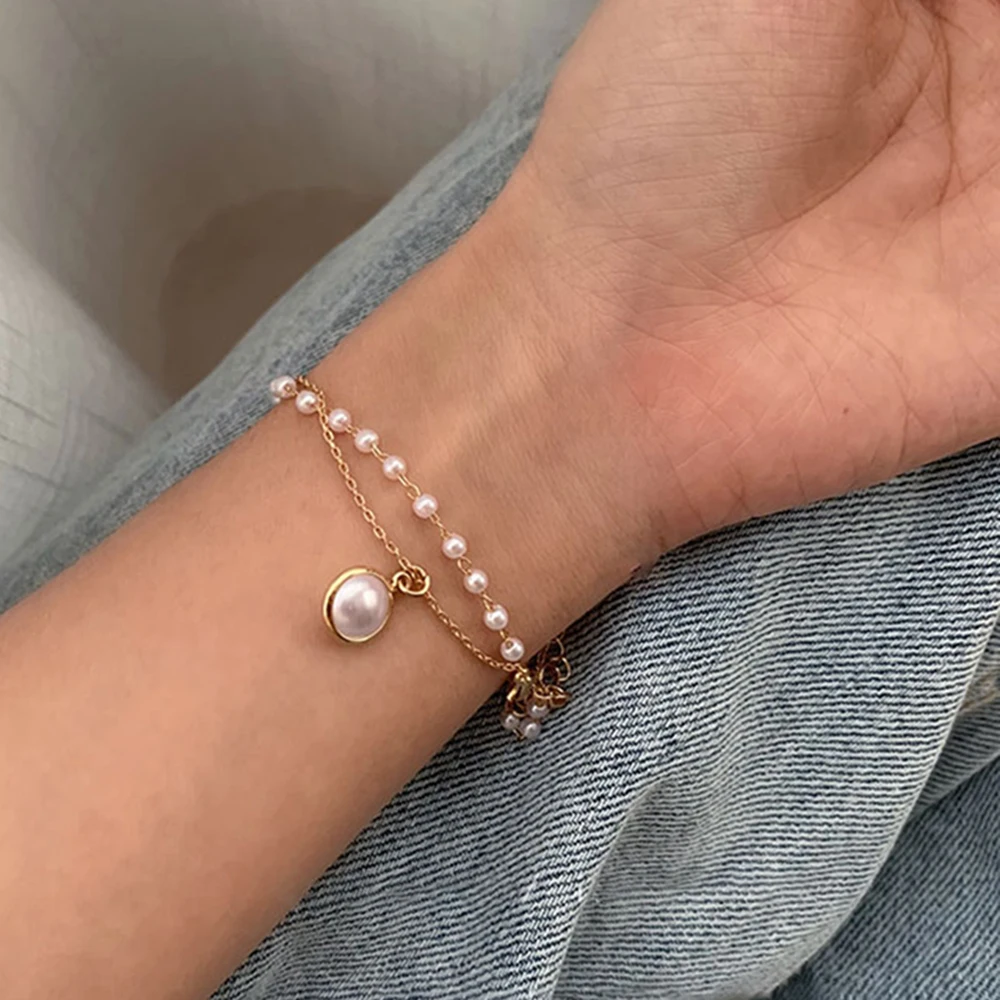 IPARAM Simple Sweet Layered Pearl Chain Bracelet Women Korean Imitation Pearl Pendant Charm Bracelet Fashion Trend Jewelry Gift
IPARAM Simple Sweet Layered Pearl Chain Bracelet Women Korean Imitation Pearl Pendant Charm Bracelet Fashion Trend Jewelry Gift