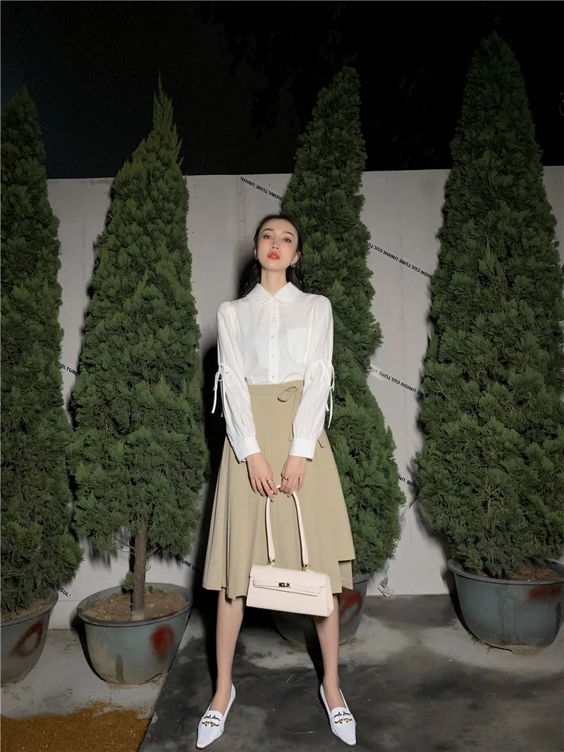 Peter Pan Collar White Long Sleeve Korean Blouse Women Puff Sleeve Top Tie Button Up Shirt Spring 2021 Fashion Clothes C472
Peter Pan Collar White Long Sleeve Korean Blouse Women Puff Sleeve Top Tie Button Up Shirt Spring 2021 Fashion Clothes C472