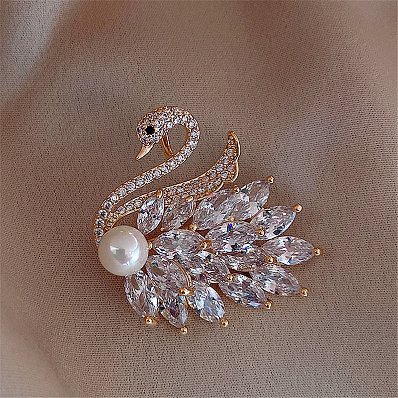 Micro inlaid zircon Swan Brooch female Brooch anti light pin sweater coat suit dress decoration atmosphere Dropshipping
Micro inlaid zircon Swan Brooch female Brooch anti light pin sweater coat suit dress decoration atmosphere Dropshipping