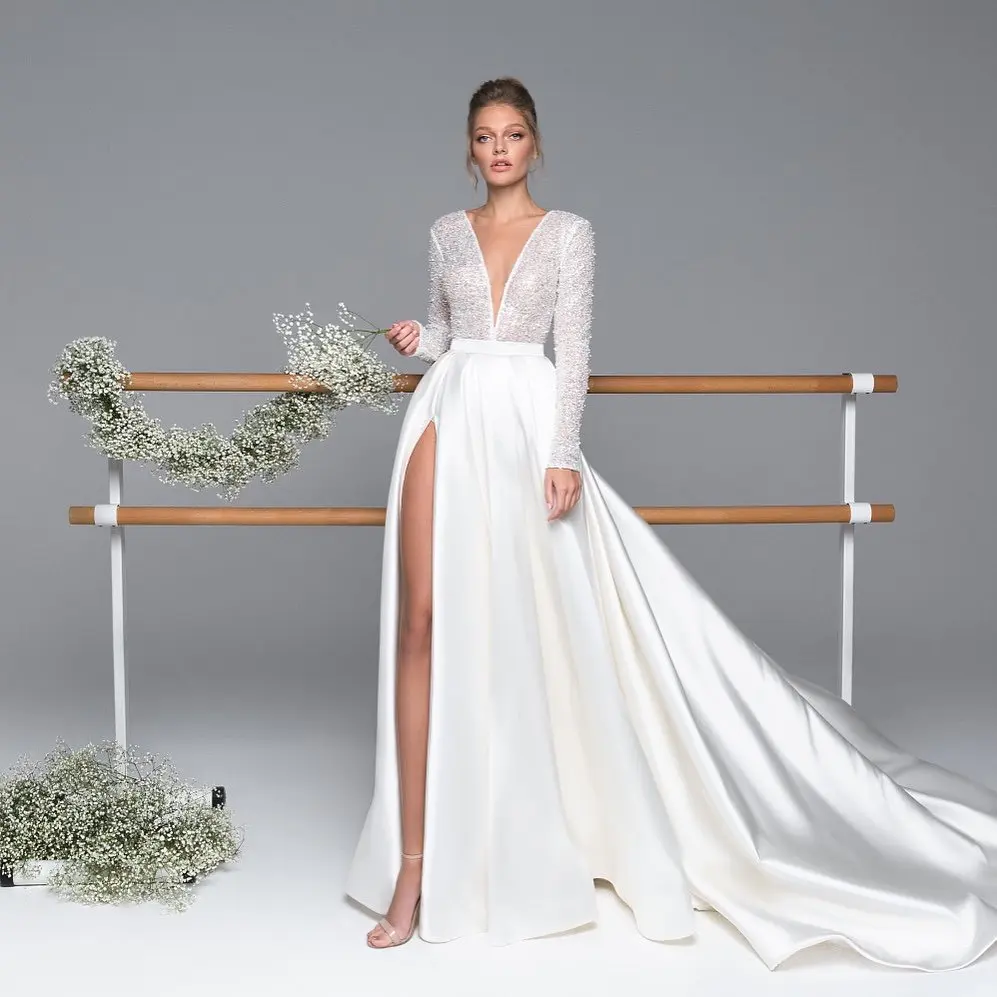 Luxury Long Sleeve Satin Wedding Dress 2021 Sexy Beaded A-Line Train Illusion Princess Bride Gown Vestido De Noiva
Luxury Long Sleeve Satin Wedding Dress 2021 Sexy Beaded A-Line Train Illusion Princess Bride Gown Vestido De Noiva