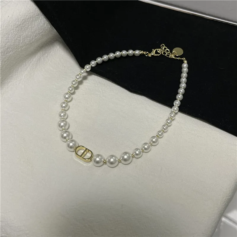 European and American ins style temperament all-match letter CD pearl choker necklace hipster bungee short necklace
European and American ins style temperament all-match letter CD pearl choker necklace hipster bungee short necklace