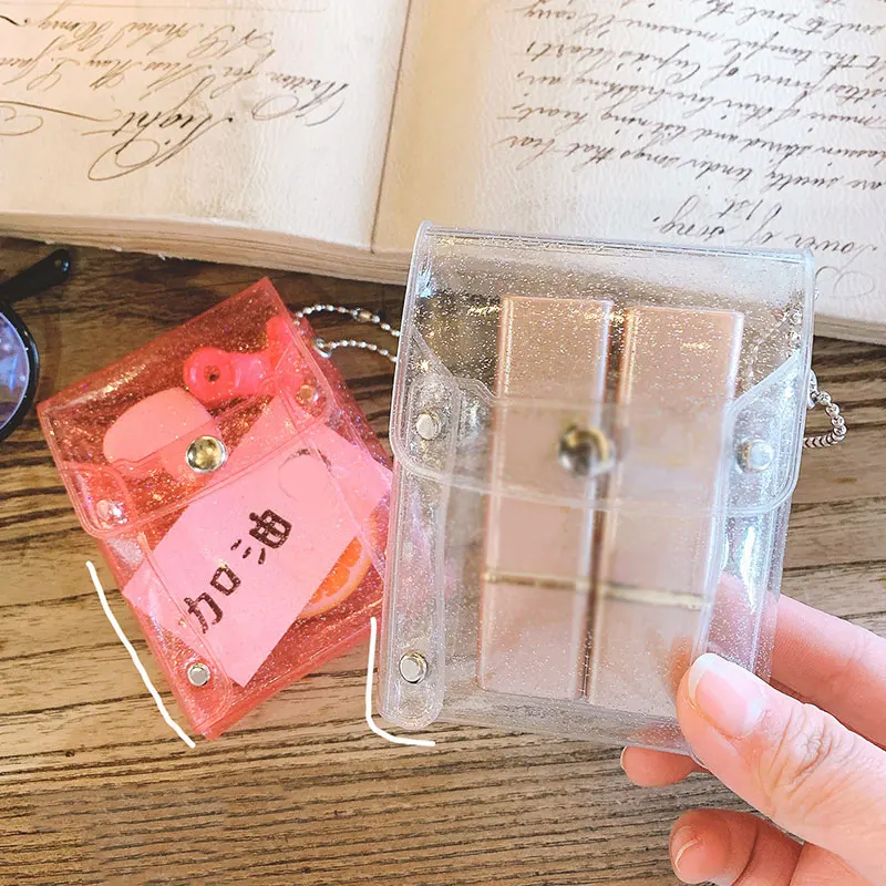 Sequins Transparent Coin Purse Key Chain Mini Bag Snap Button Portable Card Holder Hasp Lipstick Bag Storage Card Holder Bag
Sequins Transparent Coin Purse Key Chain Mini Bag Snap Button Portable Card Holder Hasp Lipstick Bag Storage Card Holder Bag