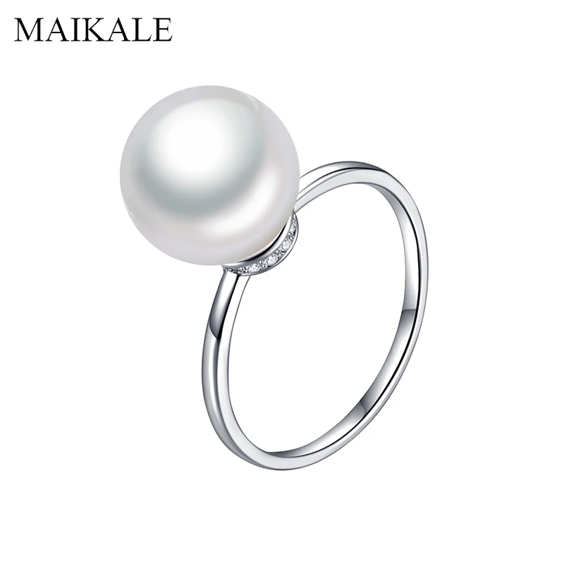 Фото Женское кольцо с жемчугом и фианитом MAIKALE простое обручальное - купить