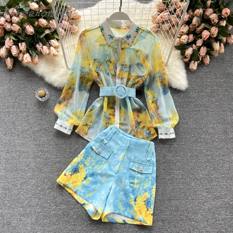 2021 Summer Chic Fashion Woman Two Piece Sets Heavy Diamond Ruffles Turn-down Collar Blouse And High Waist Wide Leg Shorts Suits
2021 Summer Chic Fashion Woman Two Piece Sets Heavy Diamond Ruffles Turn-down Collar Blouse And High Waist Wide Leg Shorts Suits
