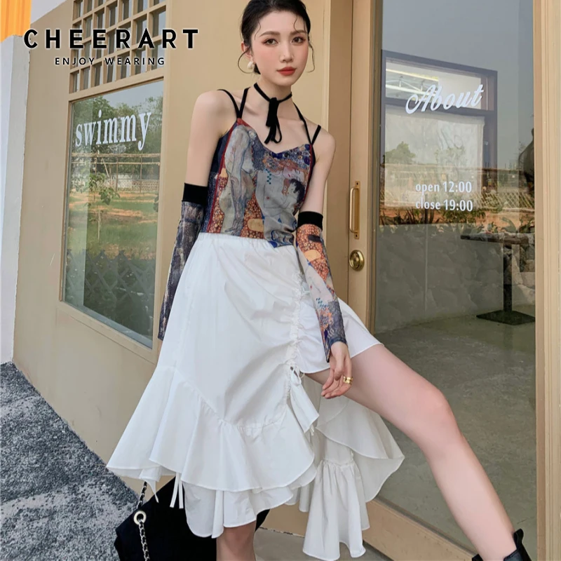 Женская ассиметричная юбка CHEERART, белая юбка с высокой талией и оборками, юбка-годе, модные дизайнерские штаны, лето 2021
Женская ассиметричная юбка CHEERART, белая юбка с высокой талией и оборками, юбка-годе, модные дизайнерские штаны, лето 2021