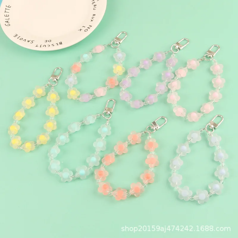 New creative candy color flower car keychain pendant cute beads transparent flower accessories couple bag decoration accessories 
New creative candy color flower car keychain pendant cute beads transparent flower accessories couple bag decoration accessories