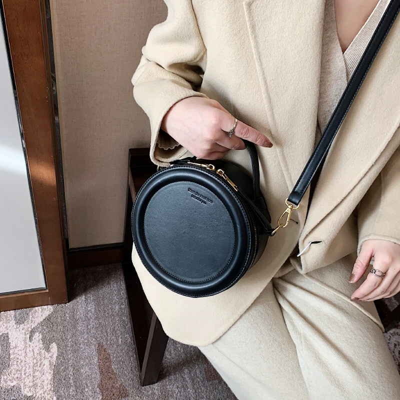 Female Handbags Shoulder Ladies Winter Leather Vintage Crossbody Purses Small Round Design Luxury Brand Bags for Women 2021 
Female Handbags Shoulder Ladies Winter Leather Vintage Crossbody Purses Small Round Design Luxury Brand Bags for Women 2021