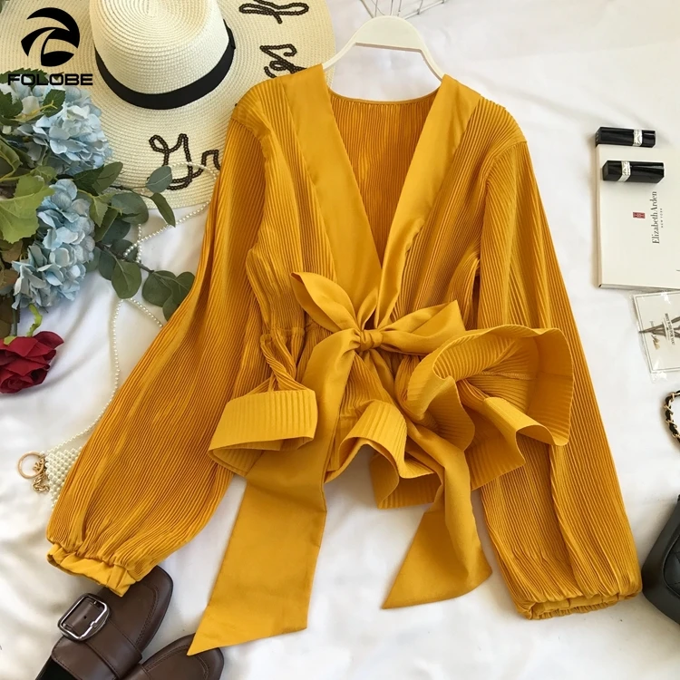 FOLOBE 2021 Spring Women Pleated Blouse Sexy Deep V Neck Bow Lantern Sleeves Ruffles Clubwear Party Fashion Female Tops Shirts
FOLOBE 2021 Spring Women Pleated Blouse Sexy Deep V Neck Bow Lantern Sleeves Ruffles Clubwear Party Fashion Female Tops Shirts